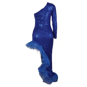 Detailed side view of elegant royal blue one-shoulder sequin dress with mesh ruffle hem