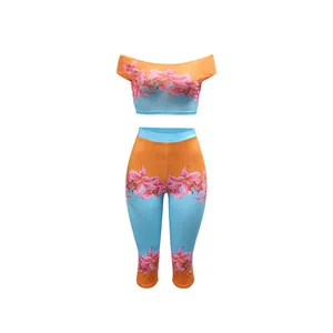Stylish two-piece set featuring floral print off-shoulder top and high-waist pants