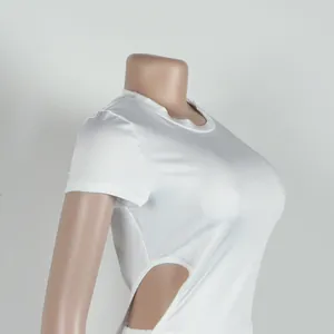 Close-up detail of the white bodycon top featuring a stylish waist cut-out design.