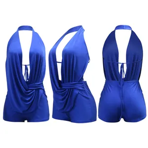 Diverse angolazioni della tutina blu reale con scollo all'americana e schiena nuda.