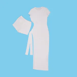 Detailed flat lay of a sexy white cutout midi dress with matching shorts two-piece set