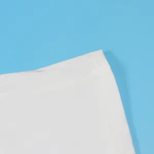 Close-up detail of high-quality stitching on white elastic bodycon skirt set