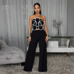 Ensemble deux pièces haut bustier noir à motif fleur et pantalon large chic