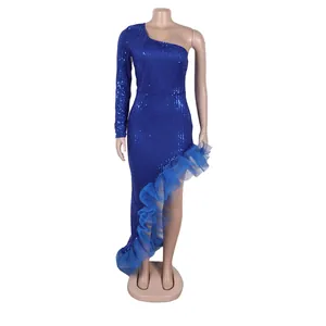 Detail of blue sequined one-shoulder dress with tulle ruffle irregular hemline