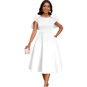 Detailed view of white midi party dress with cape shoulders and flare skirt