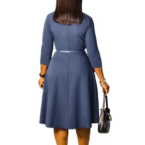 Back view of a high-waisted solid blue midi dress with a flared A-line skirt and belt.