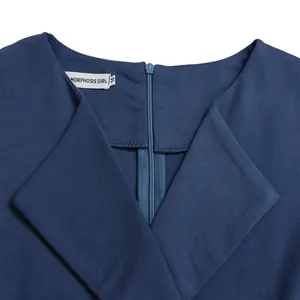Detailed macro shot showing the V-neckline and hidden back zipper of a navy blue dress