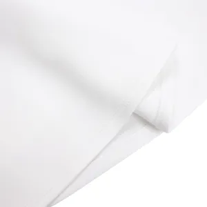 Close-up detail of the fine hemline and professional stitching on this elegant white party dress