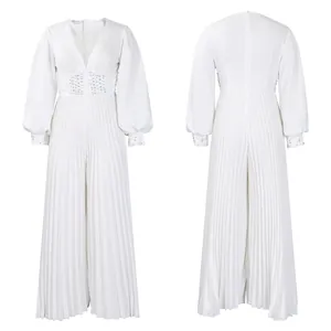 Front and back macro view of a white pleated wide-leg jumpsuit with beaded waist detailing.