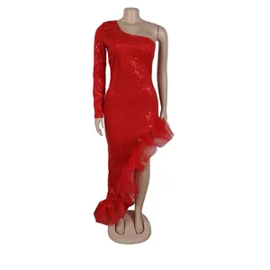 Detailed view of red sequined one-shoulder dress featuring an asymmetric ruffled mesh hem