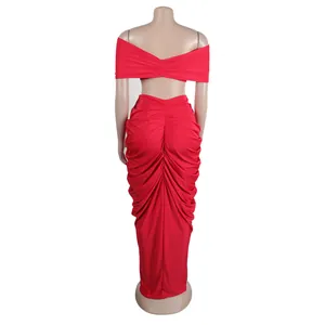 Detailed back view of a red two-piece set with ruched maxi skirt and off-shoulder crop top