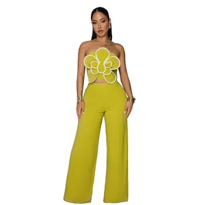 Ensemble deux pièces vert lime avec haut bustier à fleur 3D et pantalon large chic