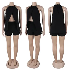 Multi-angle view of a black halter split top and matching shorts set on mannequin.