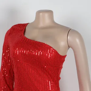 Detail of a sexy red one-shoulder sequin party dress with mesh splicing design