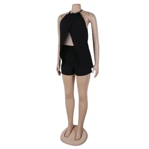 Sleeveless black halter top with front split and matching shorts two-piece set