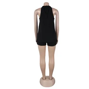Back view of a black halter neck sleeveless top and shorts set for women on a mannequin.