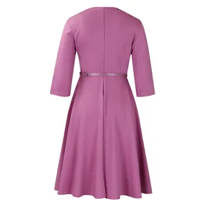 Elegant mauve high-waisted mid-length dress featuring a large flared hem back view