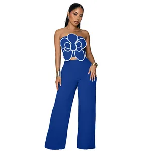 Ensemble deux pièces bleu avec bustier à fleur 3D et pantalon large fluide chic