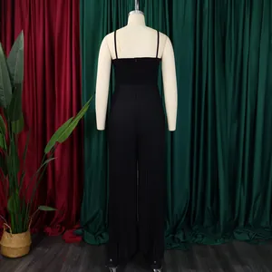 Detailed back view of a sophisticated black pleated wide-leg jumpsuit shown on a mannequin