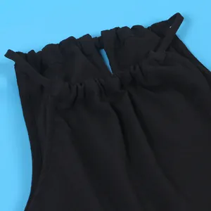 Close-up of black halter neck top with gathered neckline detail and ties