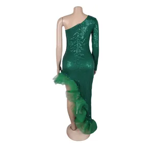 Back view of green one-shoulder sequin dress with irregular mesh ruffled hemline.