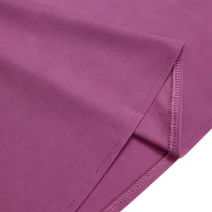 Macro detail of the purple dress fabric showing premium stitching and smooth texture