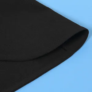 Close-up of black fabric texture and hem detail of sexy halter sleeveless set