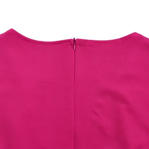 High-quality close-up of the hidden back zipper and neckline on this magenta jumpsuit