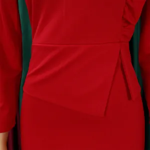 Détail d'une robe crayon rouge avec taille croisée et élégants détails de volants