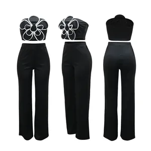 Vues détaillées de l'ensemble deux pièces noir avec haut fleur et pantalon large
