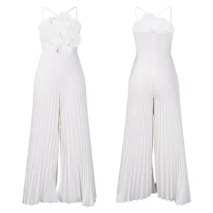 Front and back detail of elegant white pleated jumpsuit featuring large 3D flower accent