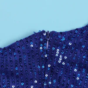 Close-up detail showing the hidden zipper and shimmering blue sequins of the evening dress