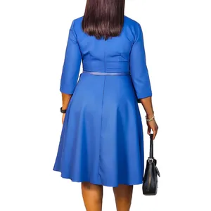 Back view detail of an elegant royal blue A-line midi dress with 3/4 sleeves and belt.
