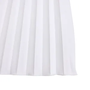 High-resolution close-up of vertical pleated fabric texture on white fashion jumpsuit