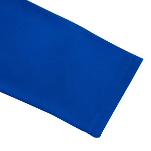 Detail of blue sleeve cuff with fine ribbed texture and durable double stitching.