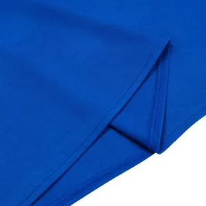 Close-up detail showing the stitching and blue fabric texture of the dress hem.