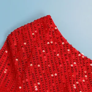 Close-up detail showing red sequined mesh fabric texture of a sexy one-shoulder dress