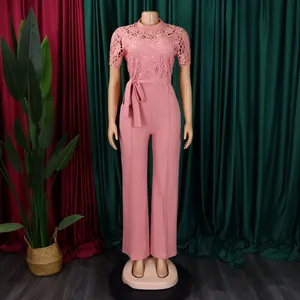 Detailed view of pink lace hollow short sleeve jumpsuit with waist belt and wide leg