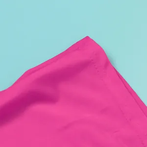 Close-up detail of hot pink elastic fabric with high-quality stitching and smooth texture.