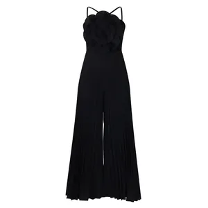 Elegant black sleeveless pleated jumpsuit with large 3D flower detail decoration