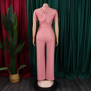 Back view of elegant pink lace hollow out short sleeve high waist wide leg jumpsuit