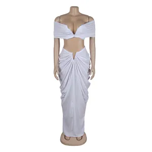 Detailed view of white two-piece set with draped maxi skirt and off-shoulder top