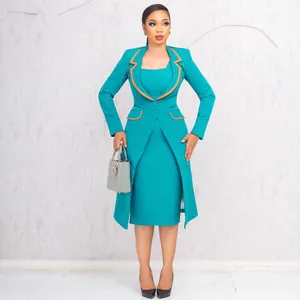 Full view of the elegant turquoise two-piece office suit on a professional model