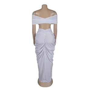 Detailed back view of white ruched off-shoulder crop top and maxi skirt set