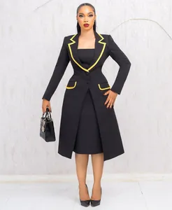 Full body view of an elegant black commuting two-piece suit set with yellow piping