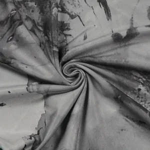 Κοντινό πλάνο του γκρι και μαύρου tie-dye ελαστικού υφάσματος με λεπτή υφή ραβδώσεων