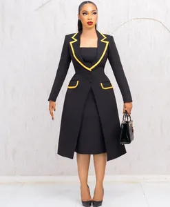 Elegant black two-piece suit set with vibrant yellow piping on lapels and pockets.