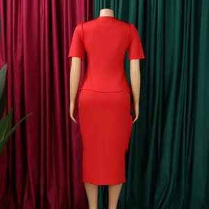 Back view detail of elegant red 2-piece set with short sleeve top and pencil skirt