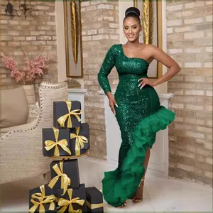 Emerald green sequin one-shoulder maxi dress with voluminous ruffled mesh hem