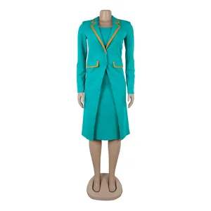 Teal two-piece suit set with orange contrast piping shown on a mannequin.